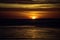 Ocean sea sunset. Sunrise sun over skyline horizon. Natural sunset over ocean. Dramatic sky.