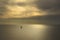 Ocean sea sunset view and black sail boat. Mediterranean sea. It