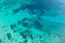 Ocean sea water surface, turquoise blue color background, aerial view. Aegean Mediterranean Sea