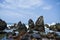 Ocean-Sea Waves, Beach Sand and Sky Clouds Rock Stones Beautiful Blue Landscape Background