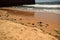 Ocean-Sea Waves, Garbage Mountains Rock Stones and Sky Blue Landscape Background