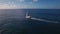 Ocean skyline and sailing yacht, aerial view