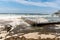 Ocean storm aftermath: A mass of thick foam covered the rocks following extreme storm weather