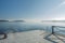 Ocean view from bathing pier with a sun beam