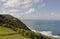 ocean view from a lush meadow