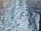 Ocean water ripples occur when ships or boats pass over the waters