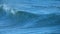 An Ocean Wave Breaking on the Beach in California