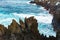 Ocean wave breaking sea water rocky shore rough seas turquoise water gradient foam background Porto Moniz Madeira