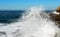 Ocean wave hitting rock bank landscape, Point Loma