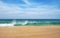 Ocean wave on a sandy beach in Thailand