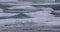 Ocean waves background video. Big waves in ocean sea on windy surf day on Oahu North Shore Hawaii, USA. SLOW MOTION shot