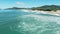 Ocean waves with beach in Brazil. Aerial view of Campeche beach, Florianopolis