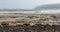 Ocean waves in Caleta Famara beach with La Graciosa Island on the background, Lanzarote