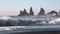 Ocean waves crush the pebble rocks of the beach in Iceland. 4K sea waves crashing on the shore. Splashes of sea storm