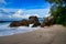 Ocean waves and granite rocks - Baie Lazare beach, Mahe Island, Seychelles.