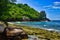 Ocean waves and granite rocks - Petite Police Beach Mahe Island, Seychelles.