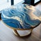 Ocean Waves Marble Table With Gold And Blue Woodcut-inspired Graphics