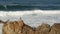 Ocean waves and rocks, Monterey, Northern California, USA. 17-mile drive near Big Sur, seaside golf tourist resort on