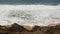 Ocean waves and rocks, Monterey, Northern California, USA. 17-mile drive near Big Sur, seaside golf tourist resort on