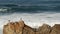 Ocean waves and rocks, Monterey, Northern California, USA. 17-mile drive near Big Sur, seaside golf tourist resort on