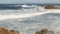 Ocean waves and rocks, Monterey, Northern California, USA. 17-mile drive near Big Sur, seaside golf tourist resort on