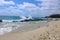 Ocean waves rolling into the beach over the rocks at 1000 Steps Beach