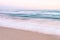 Ocean Waves on sand beach early Morning