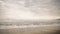 Ocean waves on Santa Monica beach in cloudy november day