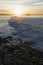 Ocean waves at sunrise with Ventura Pier, Ventura, California, USA