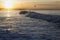 Ocean waves at sunrise with Ventura Pier, Ventura, California, USA