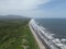 Ocean waves touching the coastline with the green field view, Playa El Espino, Usulutan, El Salvador