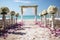 Oceans backdrop frames heartfelt vows, beachs beauty adorns idyllic wedding setting