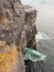 Oceans waves at the bottom of cliff, Inishmore, Aran islands, Ireland, Atlantic ocean, Cliff structure