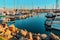 Oceanside Harbor with lighthouse and filled with boats