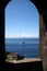 Oceanview from the Fort of Sao Sebastiao, through the port in the fortifications wall, Angra do Heroismo, Portugal