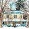 Octagon House with Teal Trim