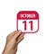 october 11th. Day 11 of month,hand hold simple calendar icon with date on white background. Planning. Time management. Set of
