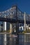 OCTOBER 24, 2016 - NEW YORK - Queens bridge to Roosevelt Island in morning light on East River shows Red Boat