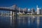 OCTOBER 24, 2016 - NEW YORK - Queens bridge to Roosevelt Island in morning light on East River shows Red Boat