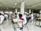 October 30, 2019, Kolkata, India. Medical students writing a medical examination in examination hall wearing white coats during