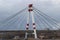 October bridge in the city of Cherepovets, Vologda Oblast, against the backdrop of a cloudy autumn sky