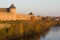 October evening at the walls of the Ivangorod fortress. Leningrad region, Russia