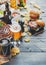 Octoberfest beer and snacks set on dark scorched wooden background