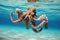 Octopus swimming underwater in a blue ocean