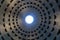 Oculus in the dome of the Pantheon from the inside, famous ancient Roman temple