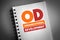 OD - Organizational Development acronym on notepad, business concept background