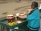 Odaikanal, Tamil Nadu, India - June 11, 2010 A roadside vendor selling fruits and snacks