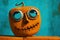 Odd junkyard scrap metal halloween mask in the shape of a Jack-o-Lantern pumpkin - generative AI