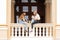 Odessa. Ukraine.2018.07.26. Two girls are sitting on the parapet of the Opera House and talking lively.