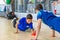 ODESSA, UKRAINE-CIRCA-2020: Children play mini-football. Futsal goalkeeper stands at gate. Sports training of children of football